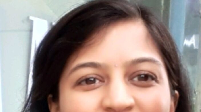 Headshot of Rashmi, smiling