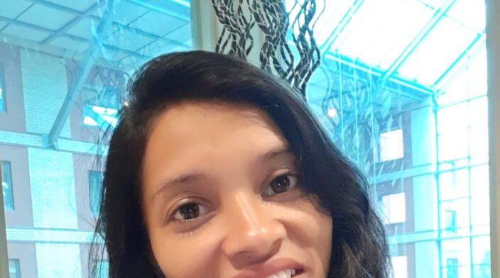 Samyuktha is a South Indian woman in her 30’s with long black hair with friendly smile.