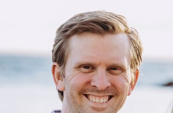 Ben is a late-30's slim white man with blond hair and deep smile lines, usually sporting several days-worth more of facial scruff than his wife would prefer, if she's being honest.