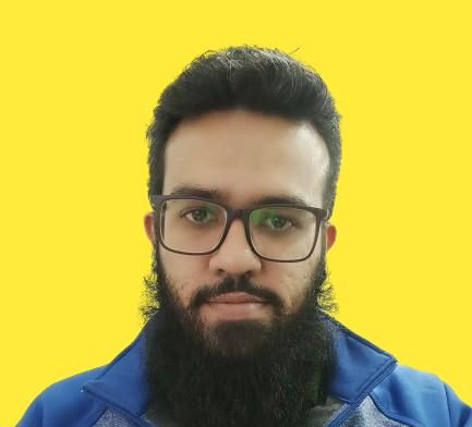 Asad is a straight person with glasses, beard and short hair.
