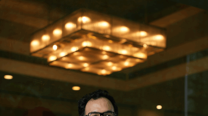 Fahad Lambate is an Asian guy in his 30’s with medium black hair and a friendly smile.