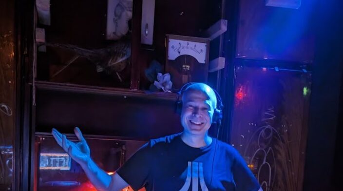 Bernd Schmitt working as a DJ in a Club