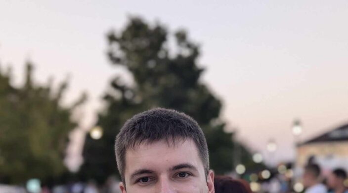 Gabriel Kanev is a white male with dark short hair. He is with a white shirt.