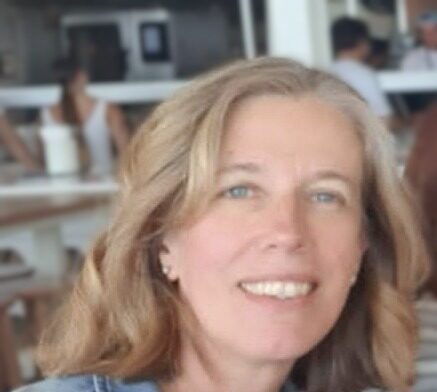 Sara Edwards is a female with fair skin and blonde hair
