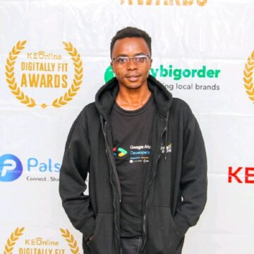 Zachary is a Black man in his late 20s with a light-to-medium skin tone, short black hair, and glasses. He has a warm, friendly smile that conveys approachability and confidence.