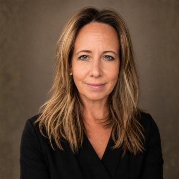 Brenda Sargeant is a white woman in her 50's with medium length light brown hair.