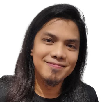 Gerson is a Filipino male with shoulder-length hair, brown skin, and a shy smile